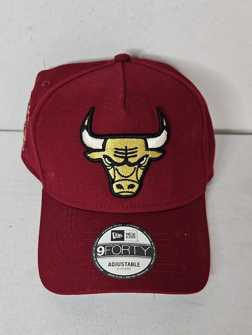 New Era 9FORTY Maroon Bulls Cap with Yellow Logo